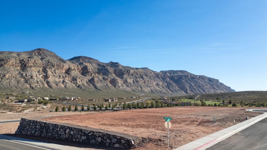 Build your dream home on this spacious 0.43-acre lot in the highly desirable Views at Hurricane Cliffs community. Surrounded by Southern Utah's iconic red rock landscapes, this premium homesite offers breathtaking panoramic views and a peaceful setting while still being just minutes from shopping, dining, and everyday conveniences in Hurricane.
Outdoor enthusiasts will love the close proximity to world-class recreation including hiking, biking, golf, and off-roading trails, along with easy access to nearby destinations like Zion National Park and Sand Hollow State Park.
Builder incentive included: Purchase this lot and receive a $25,000 builder incentive when you build with one of the community's approved builders. These trusted professionals are known for their quality craftsmanship and expertise in creating custom homes that complement the surrounding landscape.
Don't miss this opportunity to secure a premium lot in one of Southern Utah's most scenic settings and bring your vision to life at The Views at Hurricane Cliffs.