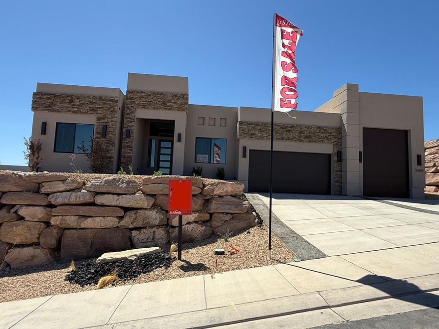 Completed New Construction!
Beautiful view of Pine Mountain from the great room!  Single level living! 33.3 ft RV garage!  Stunning quartz countertops, painted cabinets with a large knotty alder island, and GE CAFE appliances enhance the Kitchen. This home has it all. Upgrades throughout. Close to commercial retail and office professional parks; enjoy the conveniences of an urban development yet the lifestyle of a more rural setting Located just minutes from downtown, the freeway, Snow Canyon, and hiking trails.