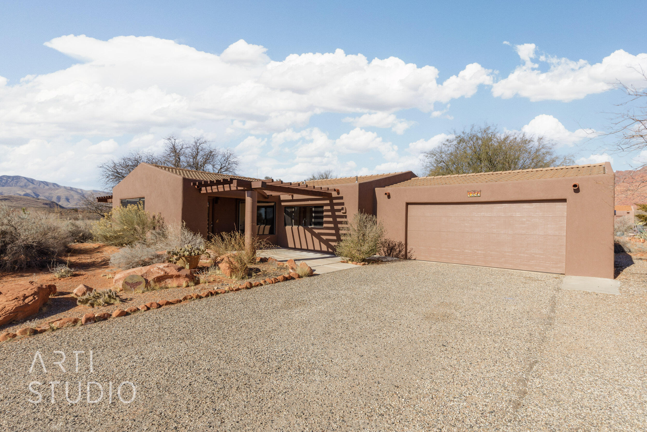 Sunny Kayenta high desert community in Ivins, Utah offers peaceful living with dark skies for moon and stargazing. This home is your cozy retreat or rentable for an investment. Large windows bring in natural light and offer a view of the outdoors. Enjoy granite kitchen counters and reverse osmosis in the kitchen. The two bedrooms have NEW carpet and there is an office or multi-purpose den for an art studio or reading a good book. Primary bedroom has ensuite bathroom. Relax on two outdoor patios with NEW pergolas and watch sunsets, sunrises and wildlife. The garage has built-in cabinets, workspace and laundry hookups. Enjoy 2 pools in the KRA (Kayenta Recreation Assoc) and the use of tennis courts. Pickleball is an additional KRA option. The home is located just a couple of blocks from Kayenta Art Village and also close to Fire Lake Park at Ivins Reservoir for bird watching or paddle boarding. Kayenta Art Village has two restaurants and a performance space booked with music, theater, dance, poetry readings and more. Meet a friend for dinner and go to a show. The home is zoned Residential Estates District. KLHOA is an incorporated condominium development but the owner owns the home footprint, See Plat Map. Owner required to be part of KRA and pays monthly for shared development insurance. Buyer to verify all information.