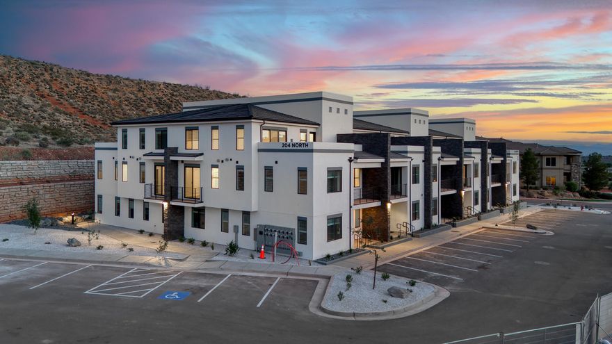 Designed for adventure and relaxation, this spacious 5-bedroom, 5-bathroom condo in Terra's Loft building offers the perfect home base for your Southern Utah escape. Spread across three stories, this thoughtfully crafted home features open living spaces, modern finishes, and a private rooftop deck with a hot tub—ideal for unwinding after a day of exploring. Enjoy access to resort-style amenities, including a pool, waterslide, lazy river, and pickleball courts, or venture out to Zion National Park, Sand Hollow, and Quail Creek. Whether you're making memories with family or friends, this condo is built for fun and convenience.