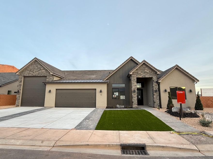 Gorgeous gable-style home: Large lot, giant slider in the great room, beautiful Red Mountain view, epoxy garage floor, wired for surround in the great room, and a 37 ft deep RV garage with RV parking on the side. The floor plan is open and light with four bedrooms and a flex room with a seperate entrance. The finishes are high-quality and beautiful: stunning iron door,  painted cabinets throughout, gorgeous countertops, GE CAFE appliances, and Delta champagne Bronze plumbing fixtures. Close to hiking and biking trails.