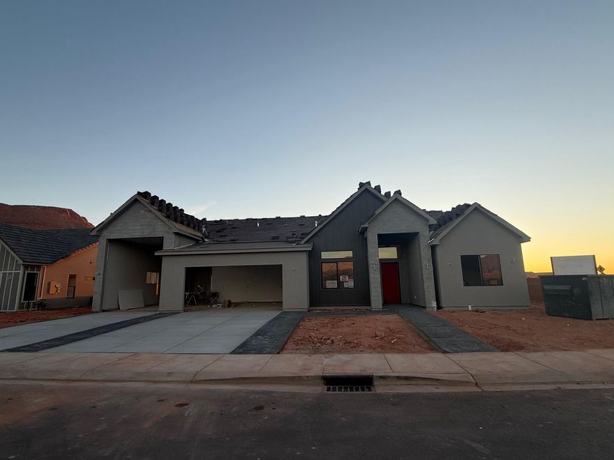 Gorgeous gable-style home: Large lot, giant slider in the great room, beautiful Red Mountain view, epoxy garage floor, wired for surround in the great room, and a 37 ft deep RV garage with RV parking on the side. The floor plan is open and light with four bedrooms and a flex room with a seperate entrance. The finishes are high-quality and beautiful: stunning iron door,  painted cabinets throughout, gorgeous countertops, GE CAFE appliances, and Delta champagne Bronze plumbing fixtures. Close to hiking and biking trails.