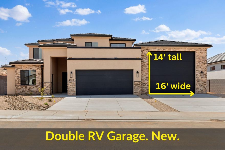This garage is an absolute beast—65' deep RV bay with a 16' wide x 14' tall door, full hookups, sewer dump, and room for everything: motorhome, boat, trailers, side-by-sides, truck, Jeep, and more. Plus 12' wide trailer parking on the side. Built by Resilient Contracting—respected for quality, craftsmanship, and attention to detail—the home is built for living large. Enjoy main-level living with a master suite, casita, and laundry room all on the ground floor. Quartz counters, butler pantry, gas fireplace, and a deck engineered for a hot tub with epic Pine Valley views. Upstairs? A huge family room where kids, guests, or gear can spread out. Ride from your garage to Sand Hollow and the dunes—this is basecamp for your next big adventure.