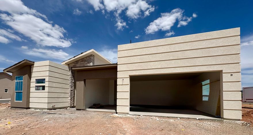 Check out this CASITA plan! This single story home has a total of 2,459 sq ft. The main house has 3 bedrooms and 2 baths with a 3 car garage.  The casita has living area, kitchenette, 1 bedroom, 1 bath with stacked washer/dryer hookups, access casita from main house or exterior covered patio entry. Featured throughout entire home LVP flooring in main living areas, soft close cabinets, quartz countertops throughout, 8' glass front door, tiled tubs and showers, black plumbing fixtures, front and backyard landscaping too! Come by and see the S&S Homes' difference! Call or text to set up a time to view this home!