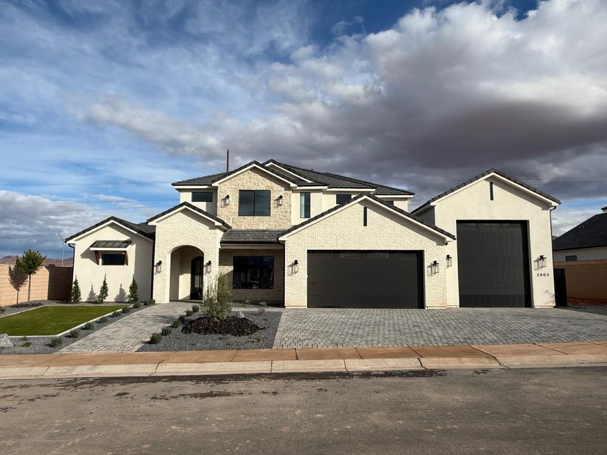 This beautiful new home located in the Arbors is nearing completion.  5 bed, 4 bath, office, RV garage, RV parking, storage loft, covered patio, covered balcony, mountain and temple views, natural stone finishes, oak cabinets, quartz countertops, wood floors, GE Cafe appliances, dual kitchen pantries, iron front door, tall ceilings, oversized windows, upgraded lighting, garage floor epoxy, and more!