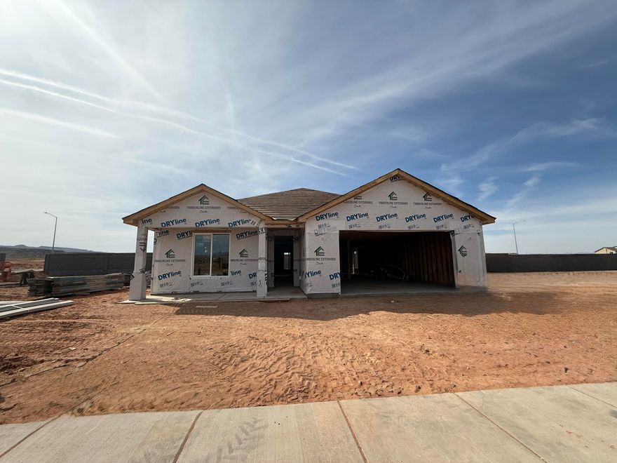 Welcome home to Legacy at Sand Hollow! Meet our Coral floorplan featuring open concept, main-level living, with a spacious primary suite. The perfect home for those needing expansive storage, and an impressive garage set up to accommodate your traditional 2-car garage + toy storage for all your adventures to come. Just minutes from Sand Hollow Reservoir, this neighborhood was designed for those who love life outdoors. Carefully tucked away for privacy, yet only about 10 minutes from your nearest grocery store and everyday essentials, this community offers the best of both worlds.  With low HOA fees and thoughtfully designed homes, it's an ideal place for anyone seeking the best that Southern Utah has to offer. All Visionary Homes are built with 2x6 framing and R-50/R-19 insulation for extra heat-cooling efficiency. Call Shannon and ASK ABOUT OUR PREFERRED LENDER INCENTIVE and schedule your private showing today.