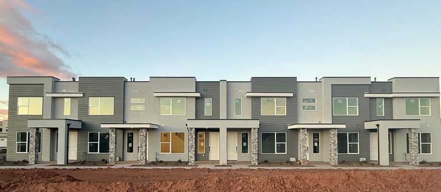 This inviting 3 bedroom, 2.5 bathroom townhome boasts a prime location just moments away from Zion Shores surf park, Warner Valley, and Sand Hollow making it perfect for outdoor enthusiasts and adventure seekers. The spacious living area flows seamlessly into a well-appointed kitchen complete with stainless steel appliances. The generous primary bedroom is complete with an en-suite and walk in closet. Two additional bedrooms provide plenty of space for guests, a home office, or hobbies and they share a stylishly designed full bathroom. A convenient half-bath is located on the main level. Step outside to enjoy your own covered patio where you can enjoy views of Warner Valley and Pine Valley.