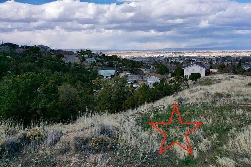 Are you looking for a private setting in Cedar City? This walk out basement lot is just off Ridge Road and ready to be built on. The lot has utilities stubbed in and is ready for someone to build on it. The lot has Pinion and Juniper Trees and is right in the heart of Cedar City on Leigh Hill.