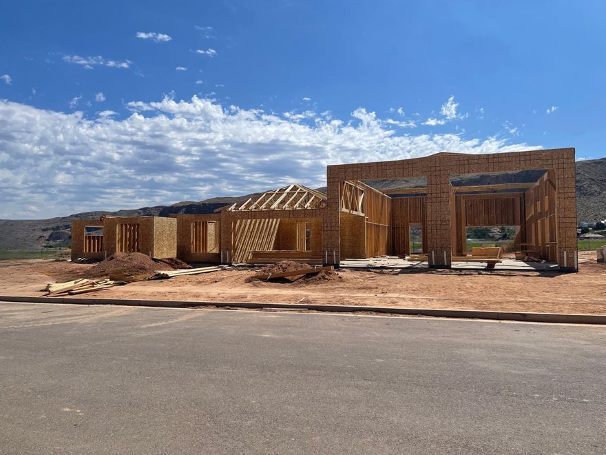 This under construction home is built to impress! Dual RV garage to store all of your toys. Roomy casita with it's own entrance, laundry and kitchenette for multi-generational living. Spacious living area with a grand kitchen and a walk in pantry.