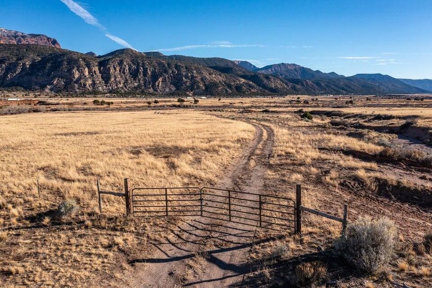 253 +- acres of prime development land contiguous with and west of I-15 with significant
potential. The property is on the south end of Iron County with easy access to Cedar City and
potential easy access to St. George. Property has an 8 inch well which is 400 feet deep with
3.39 acre feet of water rights. There is also a gravel pit on the property. Currently, property to the
west is in development and there is a possibility of access off of SR-144.
This listing consists of seven different parcel numbers and they are all currently in the greenbelt.
Tax parcel numbers will be included in document tab. Taxes only reflect one parcel. Seller has
some heavy equipment that can be sold separately.