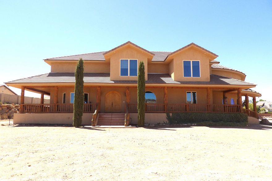 Incredible Ranch Estate with horse privileges. Entering the home you're
greeted by vast spaces for entertaining, corporate retreats & more. Massive backyard is privately
fenced in ''compound'' style & will make a great location for your next big event or just a family
get-together. 5-Car ultra-high garage houses an array of toys, geothermal heat is super-efficient &
location is superb. Sold AS/IS,All garages are plumbed for air compressor, shop Garage is wired for 220 outlets, Heating and Air is 3 Geo-thermal Heat and air pumps the air is 68 degrees constant air. Basement is fully enclosed in Concrete, 2'' foam insulation ICF forms inside and out on main floor, Plumbed for kitchen in basement, special engineered ceiling over basement that eliminates any post or wall in basement.