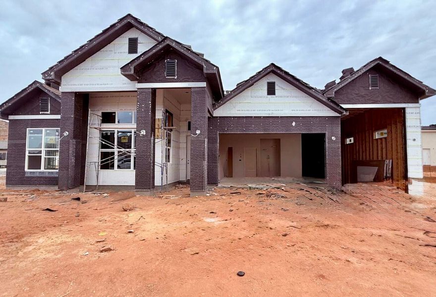 S&S Homes at Riverbend! Popular single level home with RV garage and custom pool.