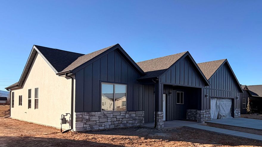 This home can be personalized and customized working with the builder, a truly rare find! Offering $10,000 to use towards closing costs, rate buydown, or home upgrades. Buyers choice! 

As configured, this 3 bedroom, 2 bath single family home blends quality, flexibility and value in the active new community Valley Gate Estates in Enoch, Utah. Enjoy a wide 530 sq ft 2-car garage, a primary bedroom with a walk-in closet, two sinks, spacious vaulted ceilings and a family room with a cozy fireplace. 

The builder is excited to meet you and go over your perfect home ideas. He is thrilled to show you active constructions, discuss options and come up with a plan. Have a time frame in mind? No problem!

Disclaimer: Photos are from another nearby construction in this exact configuration.