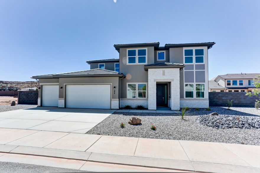 New Construction in sought-after area near Crimson Cliffs High School! Builder is offering special financing with Rates as low as 3.99%! The Pascale plan boasts two stories of thoughtfully designed living space. On the main floor, an expansive great room flows seamlessly into a gourmet kitchen with butler's and walk-in pantries. The adjacent sunroom and serene covered patio offer ample space for entertaining, as does the formal dining room. At the back of the home, an impressive primary suite showcases a walk-in closet and a deluxe bath with double sinks. A study, mudroom, laundry and covered patio are also included on this level. Upstairs, enjoy an expansive loft and 4 additional bedrooms with walk-in closets one shared bath and 2 private on suite baths. Buyer to verify all info.