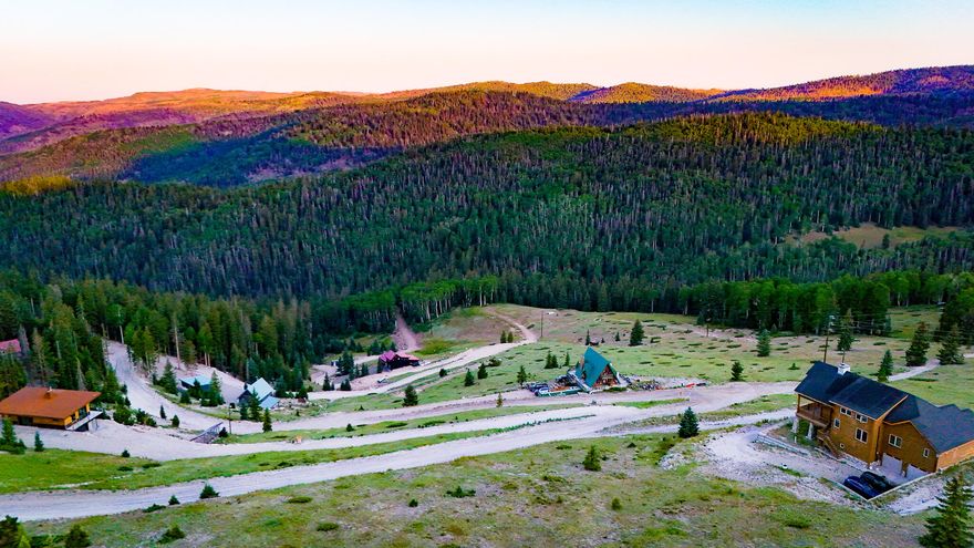 This is one of the last lots available in West Village at Eagle Point Resort.  The seller also owns Lot 29 and would entertain selling both lots for $190,000.  This would be a combined acreage of 1.71 acres.  Currently this lot is summer access only but the Elk Meadows Special Service District is required to plow the road once a home is built to gain access.  There is a new water main to the cul-de-sac.  Buyer would be responsible for buying a water pit and bringing water to the lot if/when they build a home.  Power is Rocky Mountain Power; buyer would be responsible for bringing it to lot from nearest pole if/when a home is built.  Dues listed are HOA and EMSSD which include road, snow removal and water.