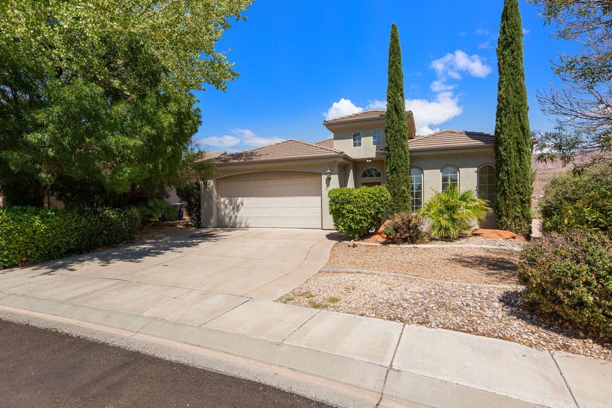 This home has recently been updated with new carpet, new paint and new LVP Floors throughout !  Located within Vintage Park Mesa across from beautiful park area.  Home has views and is located within close proximity to Zion National Park.  Open kitchen and living room floor plan with 4 bedrooms.  Come take a look and make this your new home!