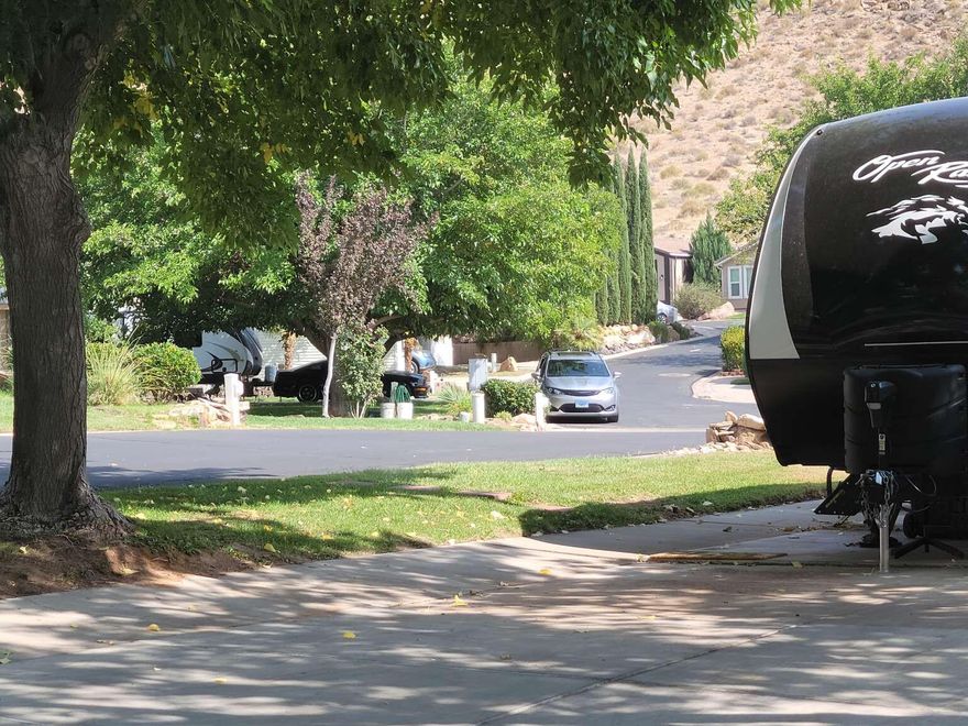 Highly desirable Harrisburg Estates Flat tree covered corner lot backing on open space located and across the street from a park. Great for nature lover because its in walking distance to Quail Creek Lake & Red Cliffs National Recreation & Conservation Area. Zoned for RV, park model, manufactured or a stick built home. Owner will carry W/$50,000 down. Balance due in 2 equal pmts 12 & 24 months after closing @ 6% interest. Property is located on the southeast corner of Redbluff Drive and Cottonwood Lane. Pls don't disturb tenants.