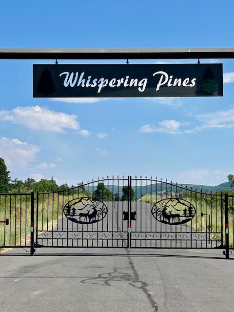 WHISPERING PINES SUB - Land