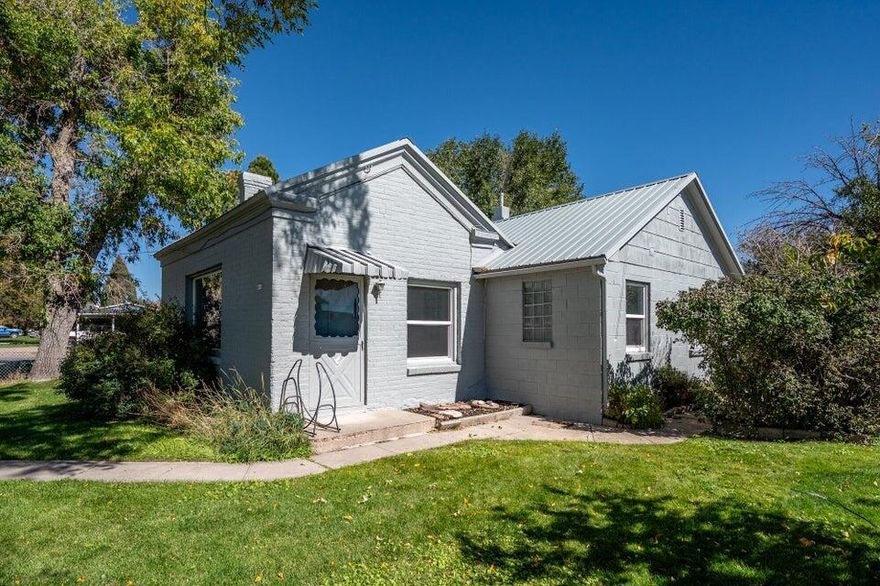 Step into this charming single-level home with three cozy bedrooms and a single bathroom. This 1,176 sq ft house features a root cellar for extra storage and a beautiful kitchen with custom white pine cabinets and lovely stained-glass accents. The property includes an adjoining lot at 335 E 500 N, parcel #03-0011-0043, together offering .46 acres, a workshop and storage shed. Located just 18 miles from Eagle Point Ski Resort, it's ideal for an Airbnb or a family home, with a school and ball fields nearby.