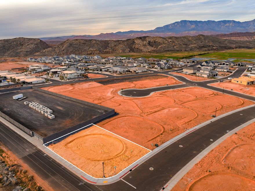 A short RZR ride from Sand Hollow Reservoir and the sand dunes, adventure starts at your garage door. Build your home base for adventure in Phase 2 of Sand Hollow Village. This lot was made for people with toys—ideal for a modest home with a massive RV garage. Keep your camper, boat, side-by-side, Jeep, and motorcycles...all the gear...on site and skip the storage unit. A place to launch big weekends, unwind after long days outside, and settle in for the long haul—whether you're growing a family or easing into retirement. Friendly, clean neighborhood with sensible CC&Rs that protect quiet enjoyment. No snooty HOA. All builders welcome. Call for an introduction to a home builder. We've been waiting for you.