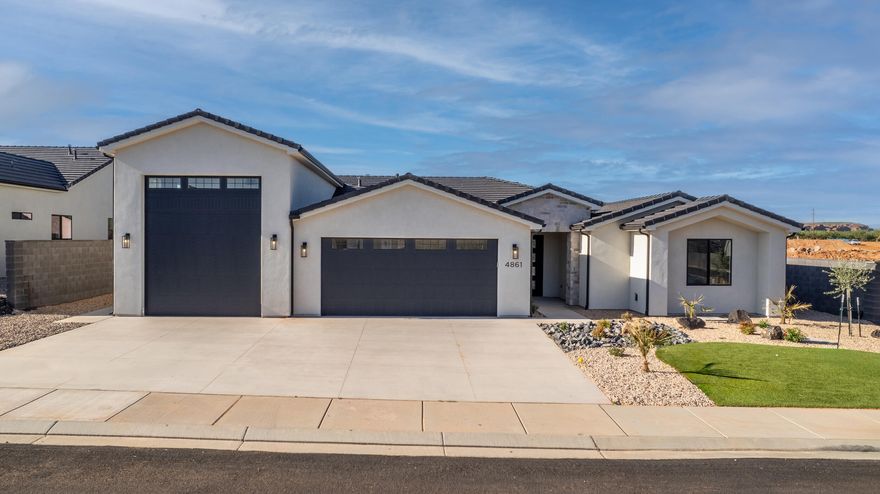 Giant, 50' long RV Garage. Plenty of room for boats, 5th wheels jet ski's. The RV garage door is 14' high and 12' wide garage opens up to almost 16' wide. Best feature of all, less than 5 minutes to the Reservoir, or dirt riding trails.
The upgraded home features extra tall ceilings  and 8' doors, with an open living space: Creates a feeling of spaciousness, light, and grandeur. Out the front, unobstructed views of Pine Valley Mountain. Upgraded Bosch Appliances: soft close cabinets with quartz countertops throughout. High-quality and energy-efficient kitchen appliances. No HOA. Casita is eligible for nightly rental. RV Garage and Casita have been rented for 1,300 per month. 15k in landscaping with mature trees recently added. Furniture can be purchased. Owner/Agent