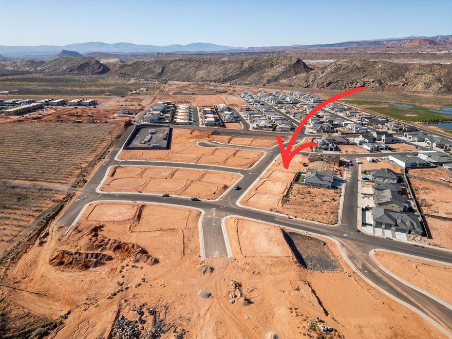 Subdivided lot in a new section of Sand Hollow Village subdivision. No HOA and on Dixie Power. Bring your builder and build the home of your dreams!