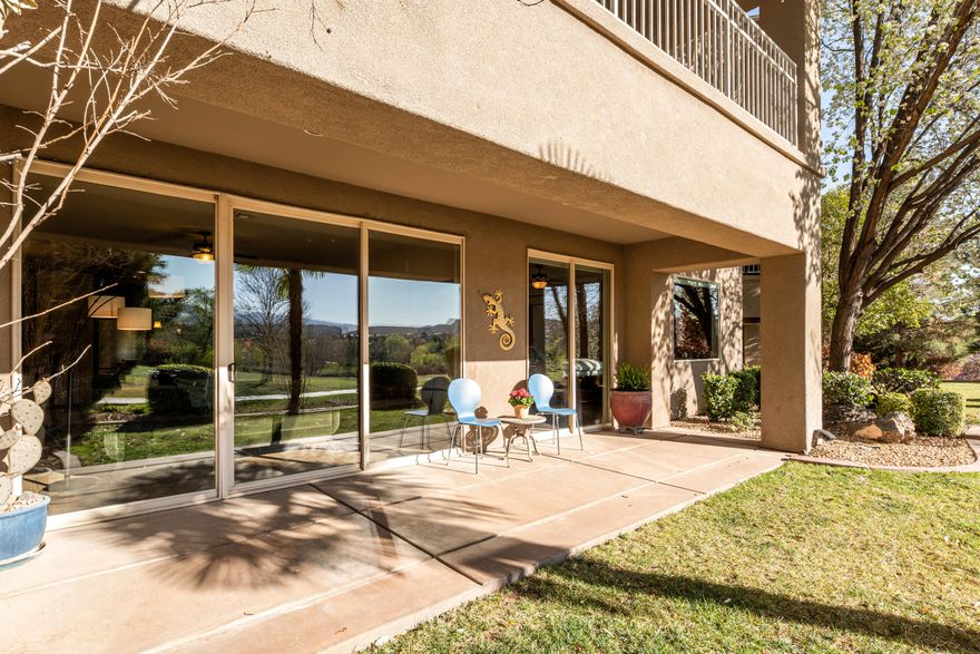 *Ground-Level Sunbrook Condo with Fairway Views*

Located in a private gated community set along the Sunbrook fairway, this well-maintained ground-floor condo has been lightly used as a part-time home and shows beautifully. The spacious layout includes three comfortable bedrooms and two en-suite bathrooms. Both feature large tile walk-in showers with dual shower heads, and the primary suite also includes a relaxing soaking tub. Granite countertops, wood cabinetry, and included appliances make the kitchen functional and inviting. Large sliding glass doors from both the living room and primary suite open to the covered patio, where you can enjoy peaceful fairway views and the quiet surroundings of this well-kept neighborhood. Natural light fills the living area during the day, while the fireplace adds warmth on cooler evenings. Community amenities include both indoor and outdoor pools, a hot tub, and a clubhouse for year-round enjoyment. The extra-wide detached one-car garage provides space for a vehicle plus bikes, golf clubs, or other outdoor gear. Most of the furniture is included in the sale, making this a quick and easy move-in experience if needed (see Private Remarks.) Conveniently located near hiking and biking trails, shopping, dining, and the Sunbrook golf community. Comfortable, low-maintenance living in one of St. George's most scenic golf course settings.