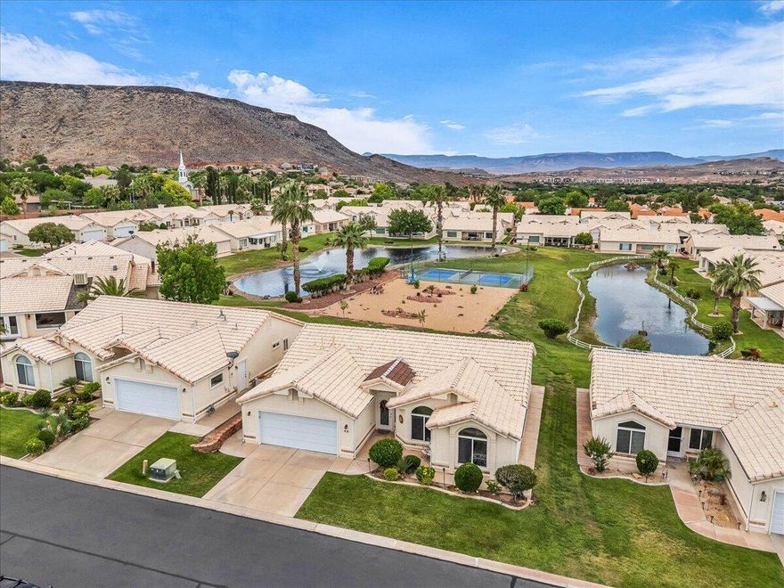 Enjoy easy low maintenance living in this beautifully updated home located in the desirable 55+ community of West Springs. Just minutes from downtown St. George. Enjoy an open floor plan highlighted by vaulted ceilings. Recent updates include new roof, carpet, furnace as well as new appliances. HOA amenities include indoor pool, clubhouse, fitness center and pickleball courts. Enjoy fantastic views of community pond behind the home.