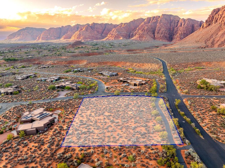 Rare Corner Lot with spectacular panoramic views in Kayenta. Discover one of the most premium building opportunities of its size and proximity. Up close and intimate with the red rocks and landscape, being able to see the cascading wateralls right from your dream home! This exceptional corner lot offers privacy and expansive, unobstructed views of the red mountains and desert landscape that define Southern Utah's beauty. Positioned perfectly to capture breathtaking sunrises and golden-hour mountain glow. Located minutes from Kayenta Art Village, Tuacahn Amphitheatre, and endless hiking and biking trails, this lot offers the perfect balance of entertainment, culture, and adventure. Enjoy the serene lifestyle of the desert while still being close to dining, golf, and community amenities.