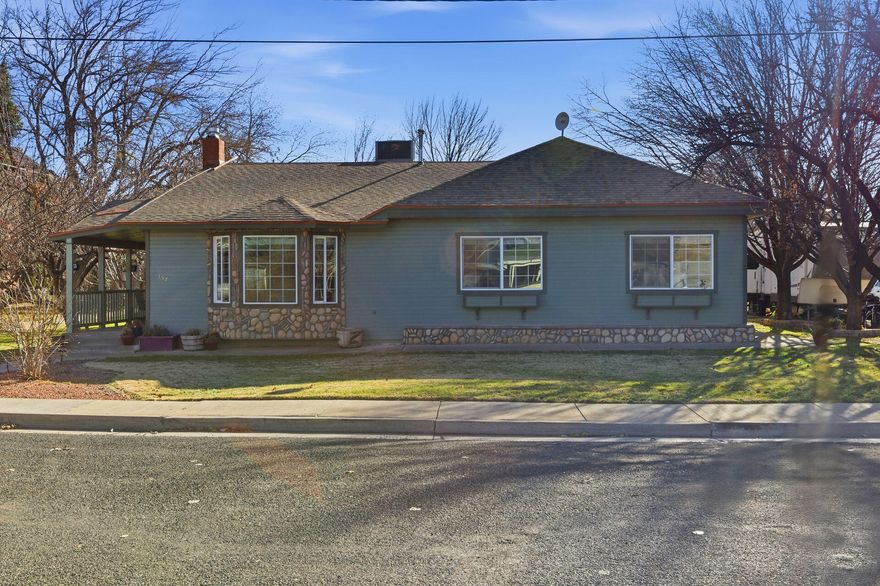 Welcome to this thoughtfully updated home that blends classic character with modern touches. Featuring 2 bedrooms plus a small bonus room, ideal for a home office, study, or hobby space. With 3 bathrooms, there's plenty of space and convenience for everyday living. The backyard provides ample room to enjoy the outdoors and features mature fruit trees along with a large storage shed/shop and an additional lot included with the sale, providing extra space, future possibilities, or added investment potential. The home also includes a small basement storage area, ideal for seasonal items or additional storage. Located in the heart of Hurricane, you'll enjoy easy access to nearby shops, restaurants, hiking trails, and all the outdoor recreation the area is known for.