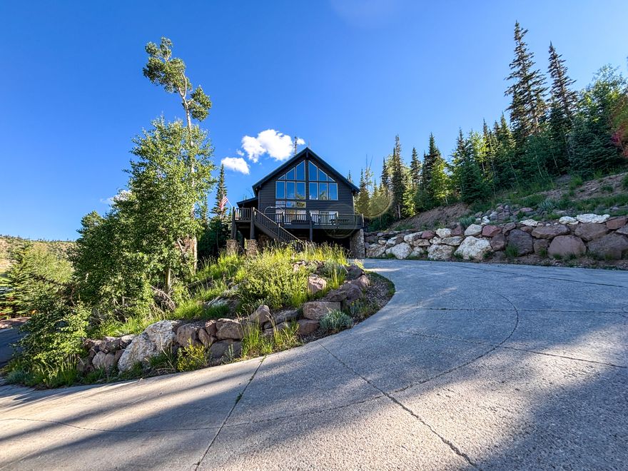 Beautiful cabin located directly across from Giant Steps Ski lift #2. This cabin was custom built with beautiful granite counter tops, wood beams, custom cabinets, slate floors in bathrooms with custom tiled showers. Family room and loft have majestic scenic views. All seasons can be enjoyed in this cabin with year round access.