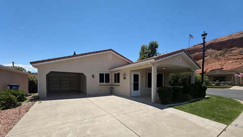 Photo of 1050 W RED HILLS 89 #89, Washington, UT 84780 (MLS # 26-273361)