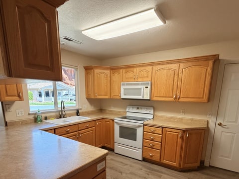 Tiny photo for 1050 W RED HILLS 89 #89, Washington, UT 84780 (MLS # 26-273361)