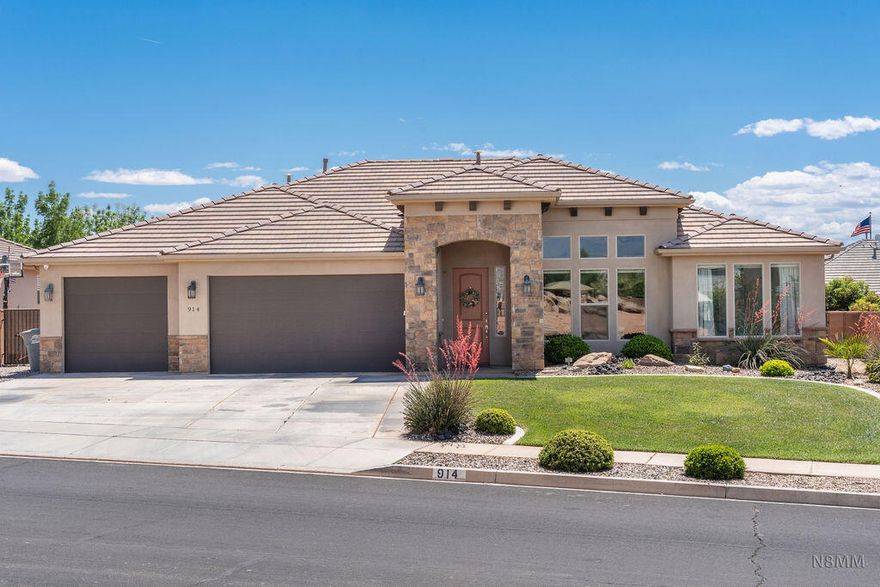 Exceptional home in a prime location within the highly sought-after Crimson school boundaries. From the moment you walk in, the 8-foot doors and gorgeous tile floors set the tone for the quality and care found throughout. The two-tone kitchen is a true standout - white cabinetry, a grey island, pull-out spice drawers, soft-close drawers, and a hidden pantry make it as functional as it is beautiful. Two primary suites offer incredible flexibility for multi-generational living or hosting guests in comfort. Laundry room includes extra cabinetry and a sink. The backyard is made for enjoying Southern Utah living - fully fenced with a hot tub under a pergola, motorized sun shade, and raised garden beds. The garage features epoxy floors and a mini-split system for year-round comfort. This one checks all the boxes...move-in ready and loaded with upgrades.