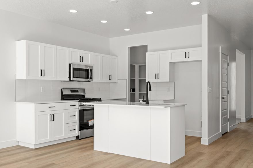 4 bed with Primary on the main level, 2.5 bath home with a 3-car garage in the brand-new Desert Reflection community by Salisbury Homes. Features include EVP flooring in main living areas and bathrooms, upgraded carpet in bedrooms, quartz countertops throughout, stainless steel gas appliances (fridge not included), modern cabinets, and kitchen backsplash. Community park, trails, and amenities nearby. NOTE: Interior and exterior finishes are predetermined and may change. Photos are examples of the finishes are also subject to change. TAKE ADVANTAGE OF A $7,000 LENDER INCENTIVE AND GET A LOWER RATE! Buyer/agent to verify all info.