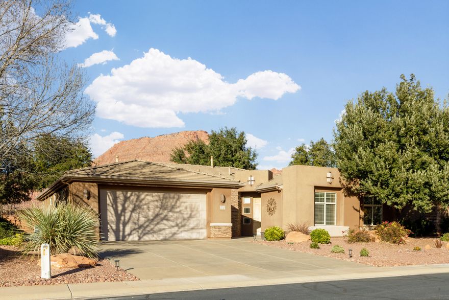 Well-Maintained, spotless  Amber Estates home in Red Rock/Snow Canyon State Park area of Ivins. Walk your dog, play pickleball  or meet your neighbors for a chat on a park bench at Unity Park at the edge of the community. The Home has lots of Natural light, Tall ceilings and eight-foot doors. Open Floor plan with all Tile flooring throughout the home. Newer appliances: Refrigerator, Gas Stove, Microwave, Dishwasher and newer Hot Water Heater. Kitchen has granite and roomy corner pantry. Two AC/Furnace units, one for primary bedroom comfort and one for the rest of the home. Extra attic insulation added. Whole house water filter. Efficient hot water recirc pump. Workbench with overhead light in extra deep and extra wide garage. Enjoy garage storage cabinets and shelves. Relax on cool north side covered back patio with a fan and extended concrete. Two fig trees, roses and flowering plants in the lush backyard. Solar window screens and other house screens are stored neatly in the garage. Home is built by Ence, Energy Star home. Front yard is xeriscaped. Opportunity for an active life with pickleball, basketball and green space in Ivins Unity Park. Home is close to Tuacahn, many hiking/walking trails with Red Rock views. Community with open common space and well-maintained landscaping.