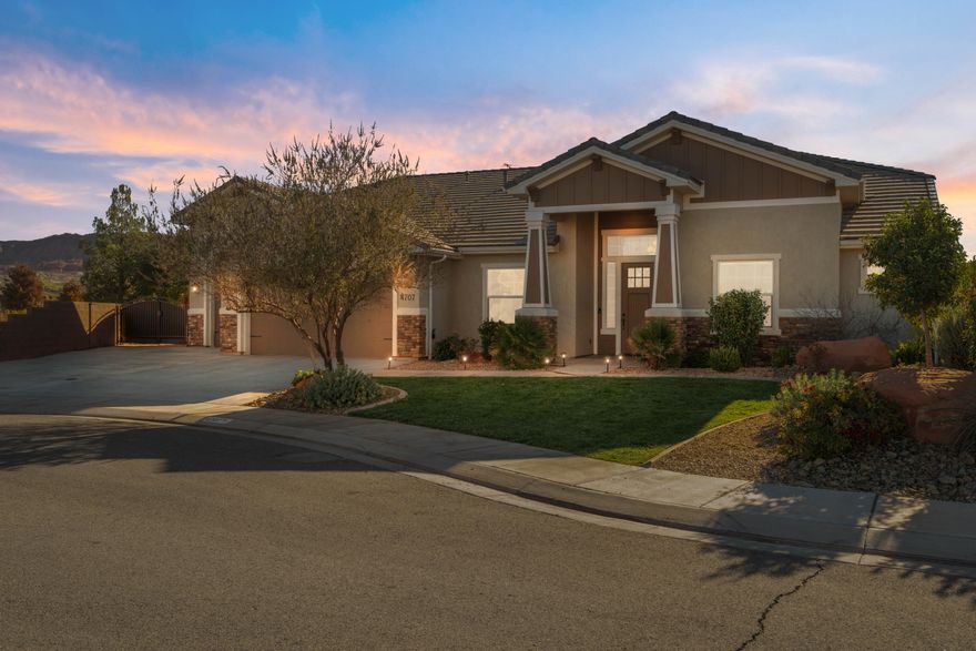 Nestled in the desirable Stucki Farms area, this 4-bedroom, 2.5-bath former builder's model home is packed with upgrades and thoughtful details throughout. Enjoy an open floor plan, upgraded finishes, 2x6 exterior walls, a radiant barrier, a reverse osmosis system, a large pantry, Everlights, and two covered patios for year-round outdoor living. The 38' heated and cooled RV garage is a standout; ideal for RVs, toys, storage, workshop, and includes built-in storage. The flexible 4th bedroom can serve as an office. Outdoor enthusiasts will love the location, ride ATVs straight from your garage to miles of Warner Valley trails, with Sand Hollow just over the hill for boating and water fun. The fully enclosed backyard with great mountain views and no backyard neighbors. Minutes from SR-7, close to great amenities, convenient to the airport, located in Dixie Power, and move-in ready.