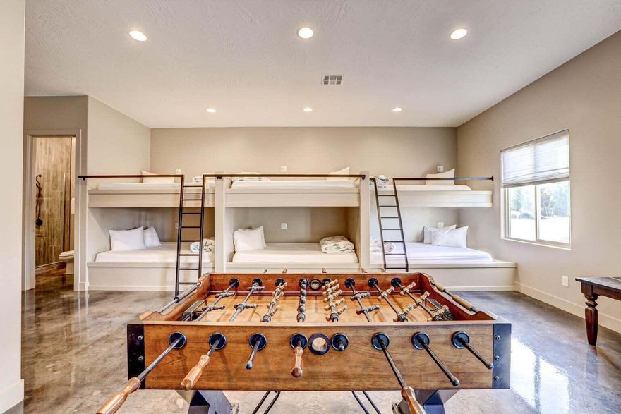 Fully Furnished Customized Rustic Retreat with Rooftop Deck & Hot Tub — the perfect space to relax and take in the scenery. Thoughtfully customized with rustic charm, featuring en-suite bathrooms, walk-in showers and more. Enjoy breathtaking, unobstructed views of surrounding mountains & desert landscapes from this beautifully designed home. 

Located in a vibrant resort-style community, owners have access to incredible amenities including three pools, spas, pickle ball courts, a fitness center, exclusive golf benefits, walking trails, and fine dining at the clubhouse. 

This home is ideal as the perfect forever home or second home investment. Conveniently situated just minutes from Sand Hollow Reservoir & the Sand Dunes, & only 30 minutes from Zion National Park. 

Please note: short-term rental restrictions apply. (See documents for details.) An application is required for nightly rental use.

Important: Buyer to verify all HOA details, listing information, square footage, and acreage to their own satisfaction. HOA documents and the latest amendment are available in the document section.  Any personal items from current owners to be excluded from the sale of the home.