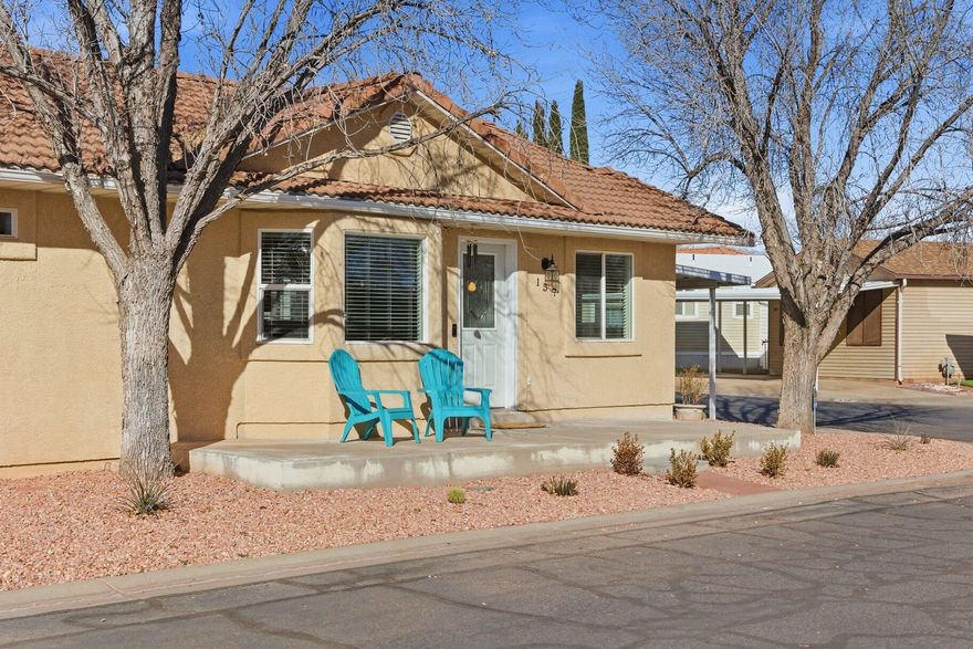 Set on a fully landscaped corner lot in the 55+ King Row Estates community, this 2 bedroom, 2 bathroom home offers 2 living spaces, 2 outdoor living spaces with a thoughtful layout and bonus basement. Features include 32'' wide doorways, a ramped walkway from the covered parking to the front door and a roll-in shower. The main living area includes an open floor concept, bay box windows, blinds, a gas fireplace, large laundry room with built-in cabinets and countertop, plenty of storage, and the spacious kitchen is equipped with Corian countertops, attached large overhang, and a reverse osmosis water system. The finished basement provides a second living room that works well for guests, hobbies, or everyday use. Additional features include a storage shed, covered parking for two vehicles, extra storage in the basement, and an alarm system. Yard maintenance is included, making daily upkeep easy. King Row Estates offers community amenities including a clubhouse, swimming pool, hot tub, and workshop in a convenient Washington location.

The home is within close proximity to plenty of shopping (including Costco and downtown Washington City). Nearby, the Grapevine Mountain Biking/Hiking trail system with easy access to hundreds of thousands of acres of public lands to fill any outdoor/ATV/UTV enthusiast's adventurous appetite. Not only is this property minutes away from a wide array of amenities, but it is also a short drive to some of America's most breathtaking destinations, including Zion National Park, Bryce Canyon National Park, and the north rim of the Grand Canyon. It is also near state parks and national forests, such as Snow Canyon, Sand Hollow Reservoir, Gunlock Reservoir, Quail Creek Reservoir, Toquerville Reservoir (coming soon) and Dixie Forest, enhancing the allure of the location. Situated at an elevation of 2,700 feet above sea level, at the crossroads of the Mojave Desert, Colorado Plateau, and the Great Basin, Southern Utah stands out as one of America's most captivating and geologically distinctive regions. This remarkable home epitomizes the essence of arriving in this extraordinary setting.

All information provided is reliable but not guaranteed. The buyer is responsible for verifying all listing details, including square footage and acreage, to their own satisfaction.