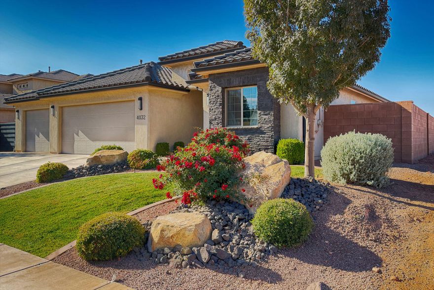 Fantastic Landscaping. Modern, inviting front entry courtyard and large entryway. Great split floorplan for Master and Guest bedrooms. Fully fenced with no neighbors behind or Northside. Located next to Bike and Walking path. Easy access to SG Airport. Fantastic landscape. Room for RV Parking.