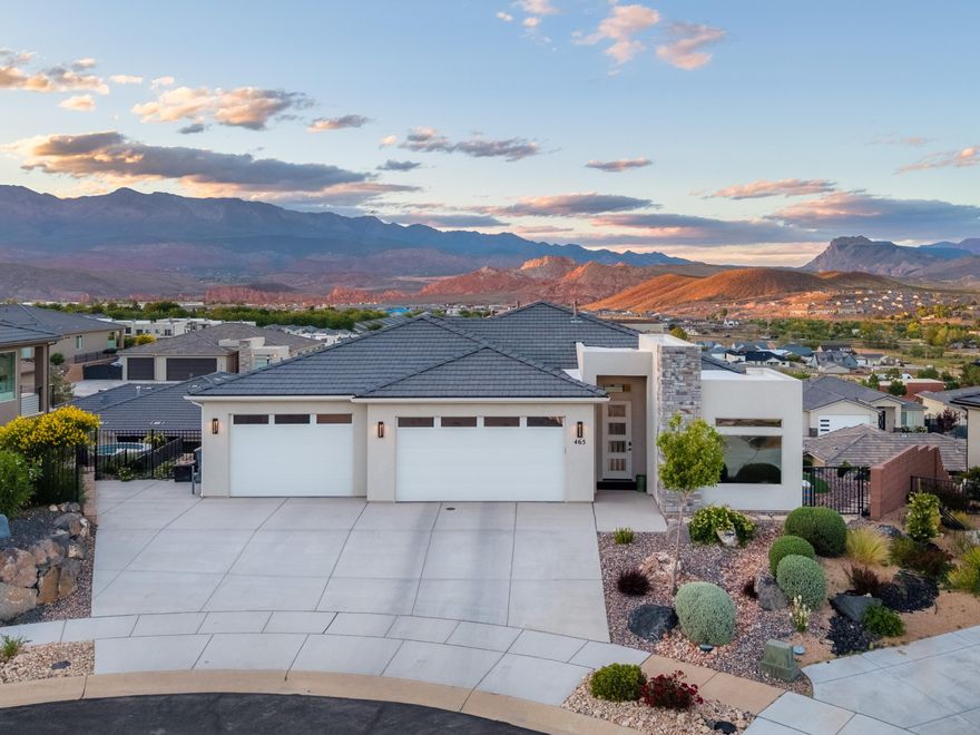 With unobstructed, 180-degree views, the pictures will never truly capture the experience you'll have by seeing this home in person. Come see this spacious 3,254 square-foot, 4-Bedroom (plus flex room) Retreat with unrivaled views. When it's yours, you'll have the unique experience of waking up to the majesty of the American Southwest. Nestled in the premier Zion Vista community, this spacious home was custom designed to showcase unobstructed panoramas of Zion National Park, Kolob, Pine Valley Mountain and the Hurricane Valley below.

Key Features:
- Versatile Layout: Featuring effortless main-level living and a full walk-out basement with oversized large guest rooms, a second kitchen, and its own laundry and entrance--perfect for multi-generational families. 

- Dedicated Workspace/Flex Room: The heated 3-car garage includes a third bay expertly converted into a private, climate-controlled space. With its own mini-split and separating wall, it's a ready-made workshop, home gym, or hobby studio.

- Indoor-Outdoor Harmony: Enjoy the horizon from the expansive covered deck or the private backyard, complete with a hot tub and gas fire pit for watching the valley lights sparkle at night.

- Community Perks: Low $44/month HOA includes access to a putting green, pickleball courts, and a pavilion.

This is more than a home; it's a front-row seat to Southern Utah's natural wonders.