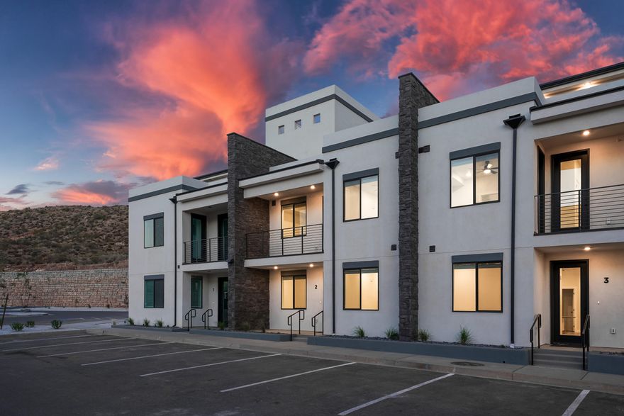 Experience elevated vacation living in this stunning 4-bedroom, 4-bathroom condo at Terra's Loft building. Spanning three stories, this thoughtfully designed retreat offers modern finishes, spacious interiors, and an open floor plan perfect for gathering and relaxing. Take in breathtaking views from your private rooftop deck, complete with a hot tub—your personal oasis after a day of adventure. With resort-style amenities including a pool, waterslide, lazy river, and pickleball courts, plus easy access to Zion National Park, Sand Hollow, and Quail Creek, your dream getaway starts here.