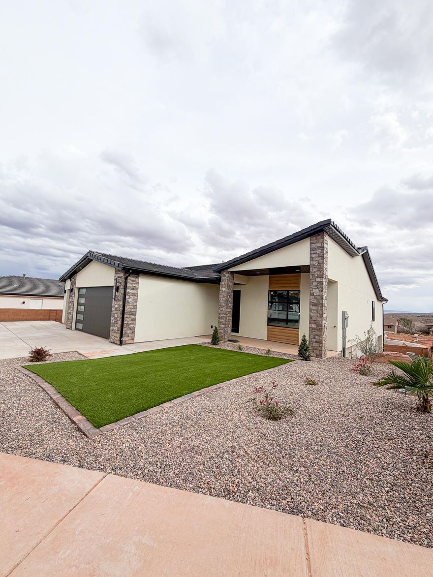 Stunning 2026 new construction in the desirable Coral Canyon community of Burke Springs in St. George! This modern home offers 6 bedrooms, 4 bathrooms, and a private ADU—perfect for guests, multi-generational living, or rental income. Eye-catching contemporary exterior with stone accents and great curb appeal. Inside, enjoy a bright, open-concept layout with spacious living areas ideal for entertaining. Quality finishes and thoughtful design throughout. Low-maintenance desert landscaping, generous driveway, and ample garage space. Close to golf, hiking, and all the outdoor recreation Southern Utah is known for. A rare opportunity in a sought-after neighborhood!