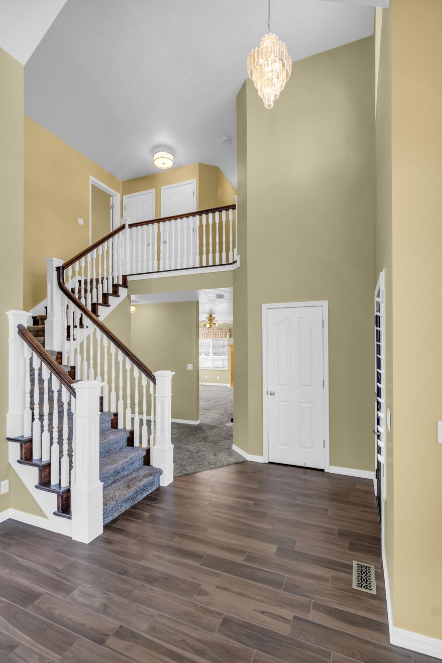 Welcome to the highly sought-after Cranberry Hills! First time on the market, this beautifully renovated home is tucked into a quiet cul-de-sac and offers the perfect blend of comfort, style, and peace of mind. Inside, you'll find all-new cabinetry throughout with quartz countertops and sinks, new flooring and baseboards, refreshed paint, updated lighting, a new Pella front door, and a completely new interior staircase. The primary bathroom is a true retreat, featuring a freestanding soaking tub and a sleek Euro-style shower. Behind the scenes, major upgrades include a new roof, rain gutters, HVAC mechanicals and A/C compressor-so you can move in with confidence. Designed for easy indoor-outdoor living, the walkout basement opens to a covered patio with storage and a fully fenced backyard,