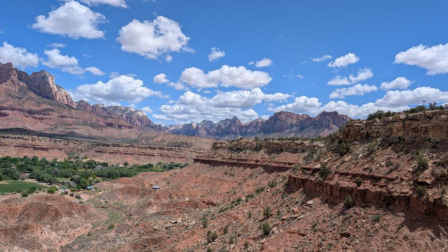 This amazing lot is 1 of 2 for sale that have stunning views of Zion National Park's majestic cliffs and the expansive beauty of the Canaan Wilderness Area.  Buy them separate or together! Elevated on the mesa above the charming town of Rockville, Utah, this lot offers a rare opportunity to own a piece of paradise with truly unobstructed and gorgeous views. 
Enjoy stunning natural sunrises and sunsets as the light dances across the iconic sandstone formations while enjoying the beauty of old-growth Pina Pines, Junipers, and flowering cactus. To the south, the rugged and serene Canaan Wilderness Area provides a dramatic backdrop and inspires exploration along the famous Eagle Crags Trail. This lot can be sold together with adjacent lot R-1308-1. Currently no utilities.