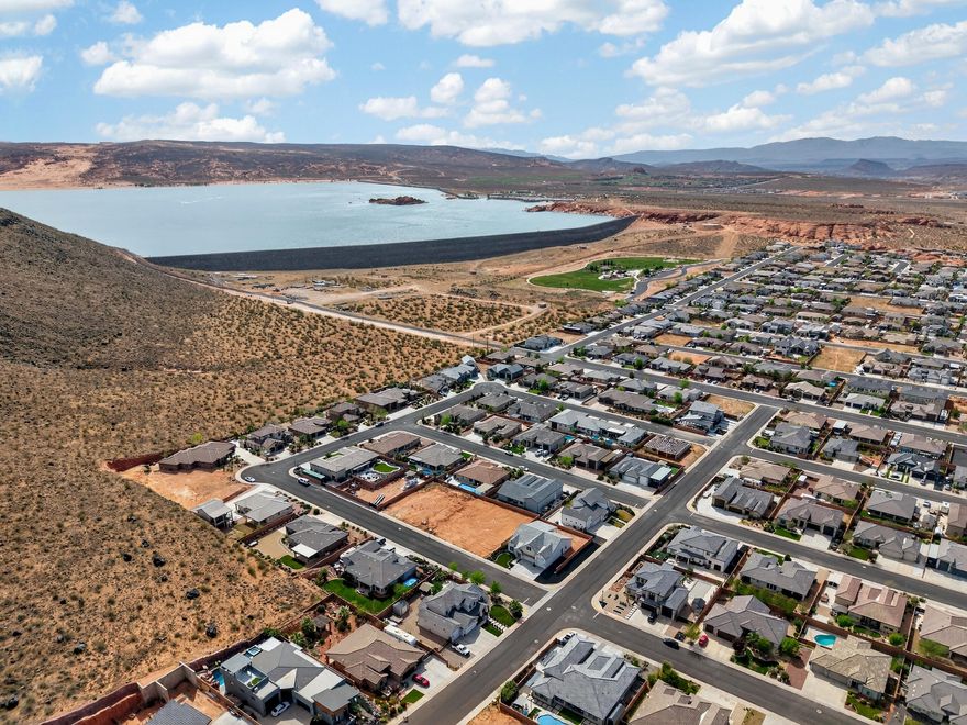 Build your dream home on this exceptional .23-acre lot in Dixie Springs--pad ready and perfectly positioned above surrounding properties, offering elevated views and added privacy. With utilities already in place, this lot is truly ready for construction, saving you time and cost.

Enjoy stunning mountain views and the freedom of no HOA, all while being just minutes from Sand Hollow Reservoir, Sand Mountain dunes, Dixie Springs Park, and a variety of nearby shopping and dining options. Outdoor enthusiasts will love the direct SXS access to world-class trail systems, along with year-round opportunities for boating, off-roading, hiking, golf, and pickleball.

Located near Zion National Park and surrounded by Southern Utah's iconic red rock landscapes, this is a rare opportunity to build in one of the area's most sought-after adventure-driven communities.