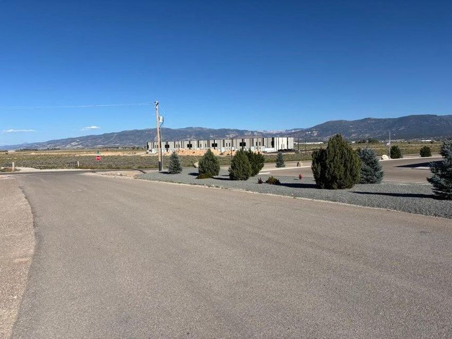 Great 5 acre lot. Prime location across from BZI's new Innovation Park, with access on Iron Springs road and 1800 N, across from Sunrise Church. Can easily be zoned Commercial. 1 acre feet of water has been transferred to the water conservancy district, connection fee not paid. Water in street, gas in the road, power overhead. This is the new commercial corridor for Cedar City with lots of development all around! Come and check it out!