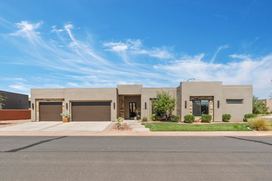 Sand Hollow Escape with Rooftop Views minutes from Zion Discover this spacious 4-bedroom, 4-bathroom home, perfectly situated in the desirable Sand Hollow Resort community in Hurricane, Utah. Each bedroom includes its own en suite bath and walk-in closet, offering privacy and comfort for all. Designed with care by a professional interior designer, this home is filled with upgrades throughout: brand-new carpet, elegant tile flooring, custom beams in the living room, upgraded lighting, ceiling fans in every bedroom, and high-end appliances. The striking wrought iron and glass front door creates a warm welcome into this thoughtfully curated home. Enjoy breathtaking views from the rooftop patio-perfect for stargazing and evening gatherings. Additional highlights include a spacious 3-car garage with EV charging, abundant storage, hot tub, three-zone air conditioning and humidifier for year-round comfort. Living at Sand Hollow Resort means access to world-class amenities: three pools, hot tubs, pickleball courts, fitness center, clubhouse, and The Grille restaurant. HOA benefits include full yard care (front and back) and exterior maintenance, offering a "lock-and-leave" lifestyle with all the comforts of a private home. Homeowners also enjoy discounted golf rates, plus special pricing on ATV, boat, and watercraft rentals at nearby Sand Hollow Reservoir. With Zion National Park just 30 minutes away, Zion Canyon Hot Springs only 20 minutes, and Bryce Canyon within easy reach, this location offers endless opportunities for adventure. All of this, right next door to the dunes and 5 minutes from the lake, makes this home a perfect retreat for both relaxation and recreation. Square footage figures are provided as a courtesy estimate only and were obtained from County. Buyer is advised to obtain an independent measurement.
