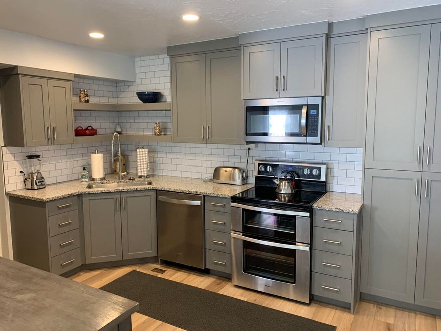 Beautifully remodeled townhome in the heart of St. George. Parade Home quality with recent upgrades to kitchen, bathrooms, walls, base boards, flooring, hardware, appliances, thermostat, outlets and switches, drywall and paint, etc... I've been told the remodel cost somewhere around $70,000. 
Private upstairs deck looks over the communities pool and has those incredible St. George views!
This unit is priced to sell and seller is solid at $300k.
Owner/Agent