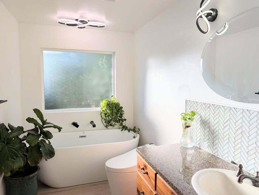 This move-in-ready home has been completely redone with over $80,000 in materials and fully permitted work by licensed professionals. Updates include: new HVAC, electrical, plumbing, windows, siding, metal roof, sheetrock, doors, flooring, paint, carport, and appliances.

Interior features include granite countertops, wood-faced cabinets, stainless steel appliances, a full-size soaking tub, and bright open-concept living with large new windows. The kitchen and pantry offer excellent space compared to similar homes.

Additional highlights:
-6'' exterior walls with upgraded insulation
-Large landscaped yard with automatic watering
-Covered parking
-8x12 shed with cabinets/countertops

Located in Canyon View Mobile Home Park. Lots are rented, so no property taxes.